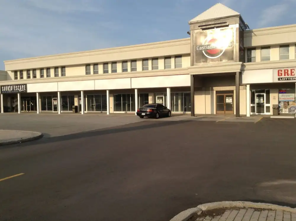 A car parked in front of a building.