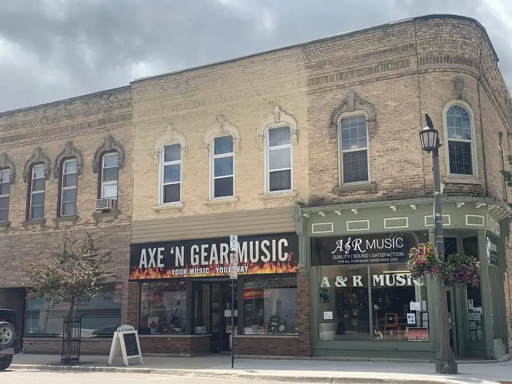 A building with several windows on the side of it.